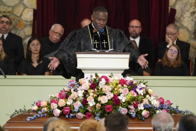 Pastor Tony Lowden delivers the eulogy during the funeral service for former first lady Rosalynn Carter at Maranatha Baptist Church on Wednesday in Plains, Ga., calling on loved ones to "live on her legacy." Pool Photo by Alex Brandon/UPI