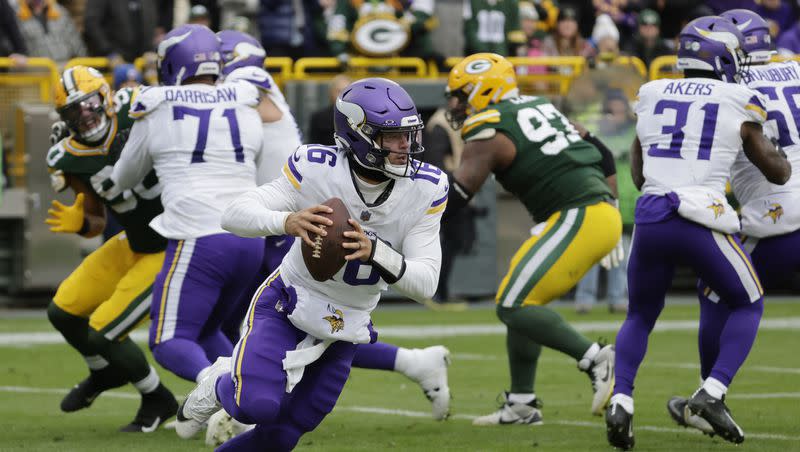 Minnesota Vikings quarterback Jaren Hall (16) looks to pass during the second half of an NFL football game against the Green Bay Packers, Sunday, Oct. 29, 2023, in Green Bay, Wis. 