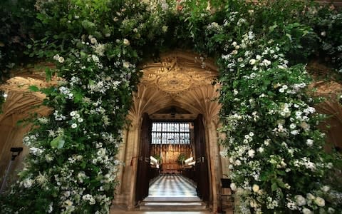 Flowers adorn the front of the organ loft inside St George's Chapel at Windsor Castle - Credit: Danny Lawson /PA