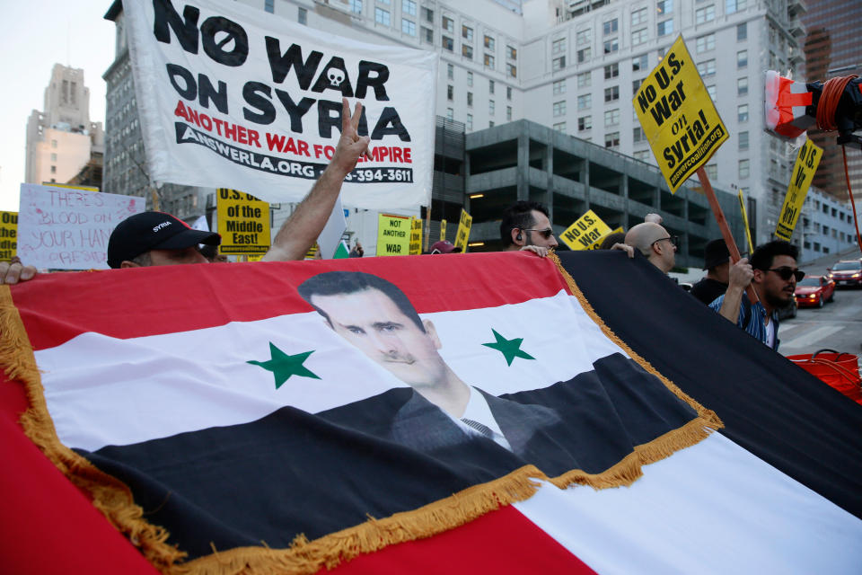 <em>Protests – Syrian-Americans have expressed their anger at the missile strikes on their homeland during an anti-war rally in Los Angeles (Picture: AP)</em>