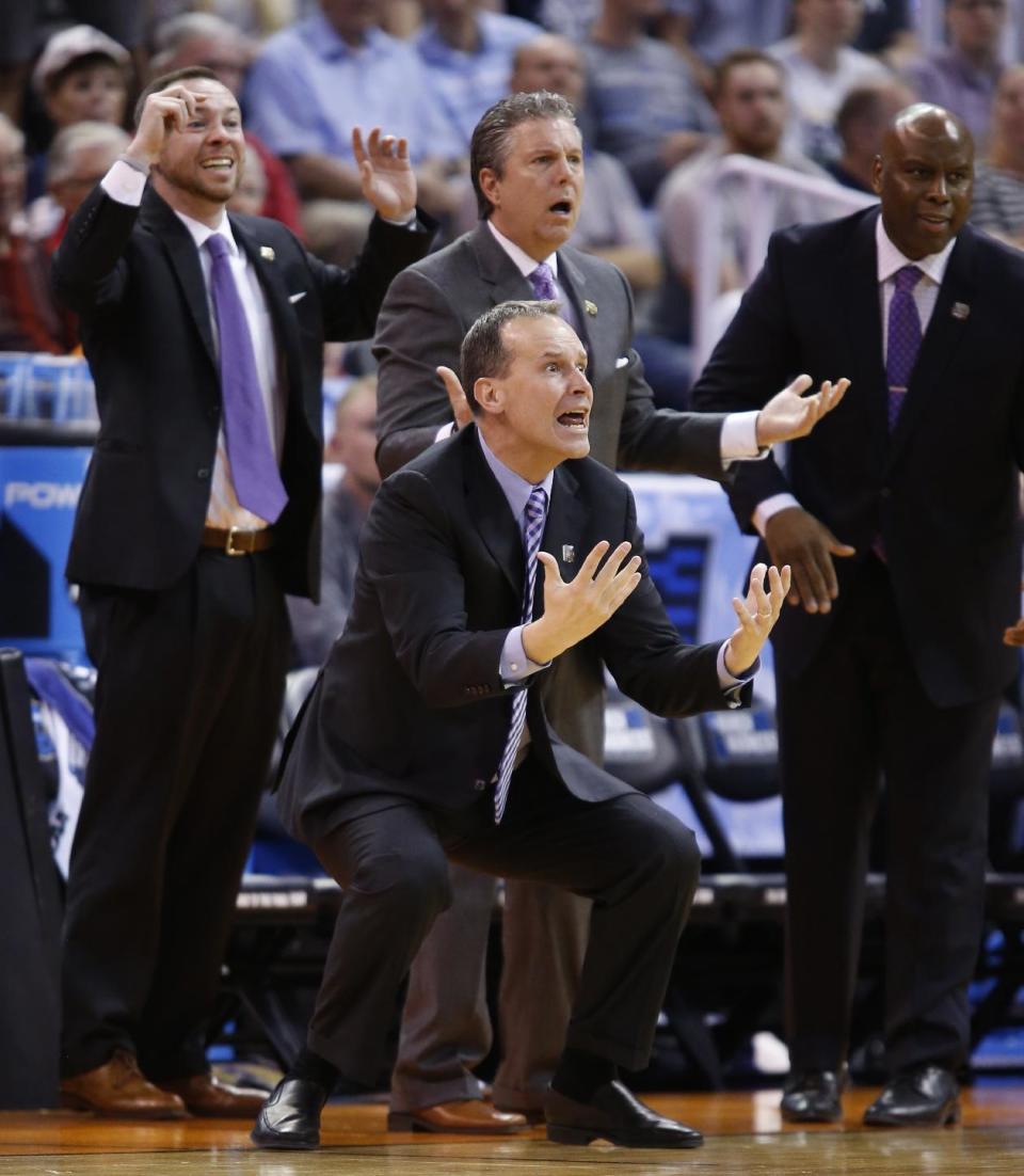 Northwestern head coach Chris Collins yells at officials during the second half of a second-round college basketball game against Gonzaga in the men's NCAA Tournament, Saturday, March 18, 2017, in Salt Lake City. (AP Photo/George Frey)