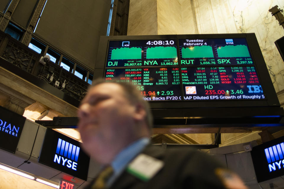 NEW YORK, NY - FEBRUARY 04: A trader walks by a screen as results are shown on a display as traders works on the floor of the New York Stock Exchange (NYSE) on February 4, 2020 in New York City. The markets rebounded after a fall last week on coronavirus fears. (Photo by Eduardo Munoz Alvarez/Getty Images)