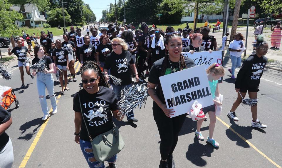 The Buchtel Community Learning Center staff served as grand marshals as they marched in the parade.