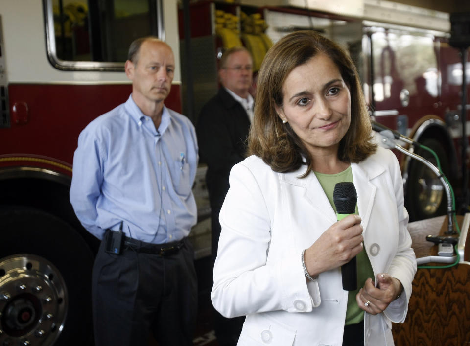 FILE - In this Sept. 13, 2010, file photo, then-Pacific Gas and Electric President Chris Johns, left, and then-vice president of energy delivery Geisha Williams, right, address questions during a news conference in response to a gas pipeline explosion in San Bruno, Calif. PG&E said Sunday, Jan. 13, 2019, that CEO Williams was stepping down and that John Simon, the company's general counsel, would serve as interim CEO until a replacement is found. (AP Photo/Marcio Jose Sanchez, File)