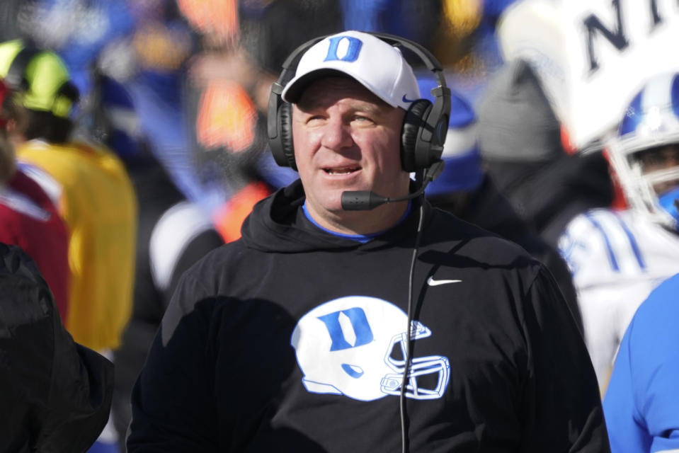 FILE - Duke head coach Mike Elko paces the sideline against Pittsburgh during the first half of an NCAA college football game on Nov. 19, 2022, in Pittsburgh. Duke's ball-control offense will go up against a coach known for playing up-tempo. Gus Malzahn and UCF take on the Blue Devils in the Military Bowl on Wednesday, Dec. 28. (AP Photo/Keith Srakocic, File)
