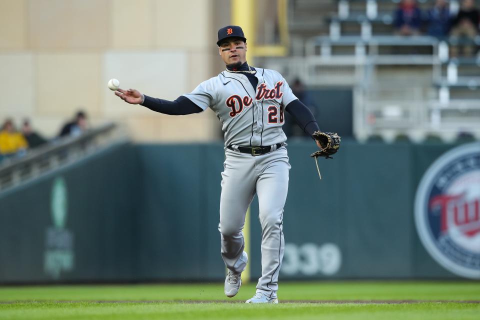 Tigers shortstop Javier Baez throws the ball to first base to get out Twins catcher Ryan Jeffers in the second inning on Tuesday, April 26, 2022, in Minneapolis.