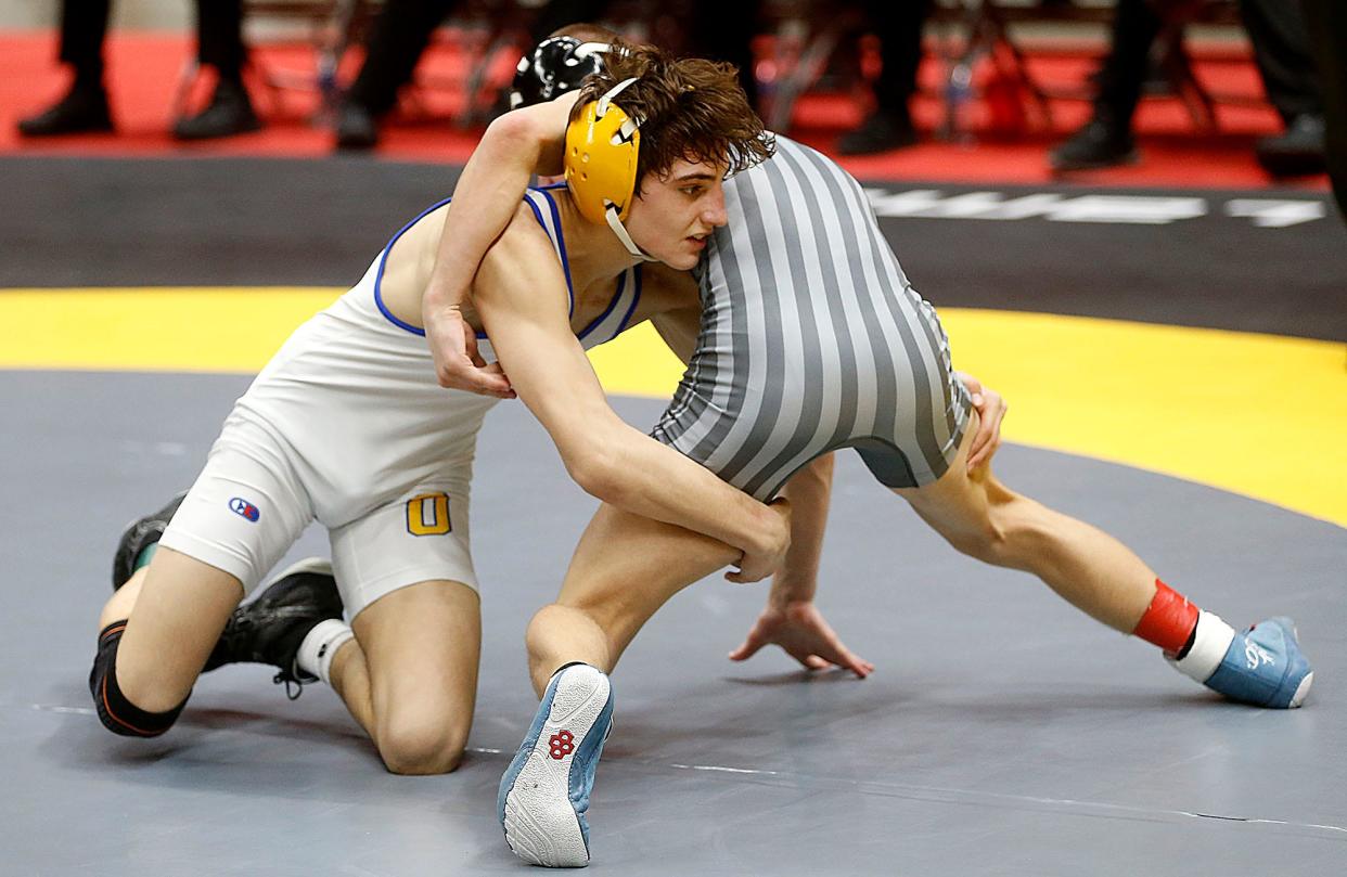 Ontario's Aiden Ohl wrestles Canton South's Dom Prosperi during their 106 lbs. match at the OHSAA State Wrestling Championships Friday, March 10, 2023 at the Jerome Schottenstein Center. TOM E. PUSKAR/ASHLAND TIMES-GAZETTE