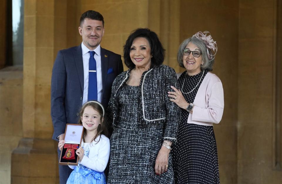 Bassey, with her daughter Sharon, her grandson Sebastian and his daughter Sofia (PA)