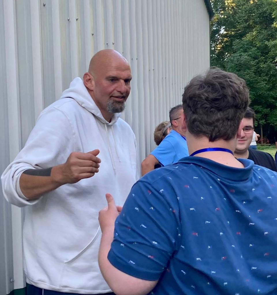 Lt. Gov. John Fetterman greets a supporter on Aug. 27, 2022,  at Demstock, a two-day event for rural western Pennsylvania Democrats held at the Venango County Fairgrounds south of Franklin. Fetterman addressed voters at Demstock as part of his winning campaign for U.S. Senate.