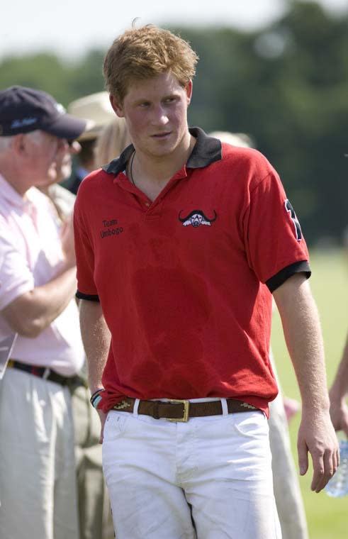 At a charity polo match in 2009 Prince Harry threw on a red and black polo shirt and kept his hair looking rugged.