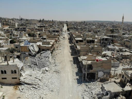 The strategic northwestern town of Khan Sheikun, which Syrian government forces entered on Wednesday, had ben heavily damaged by air strikes and shelling and the great majority of its residents had already fled