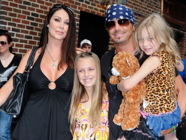 <p>Ray Tamarra/Everett Collection/Alamy</p> Bret Michaels with his partner Kristi Gibson and their daughters Raine and Jorja visit the 'Late Show With David Letterman' on July 12, 2010