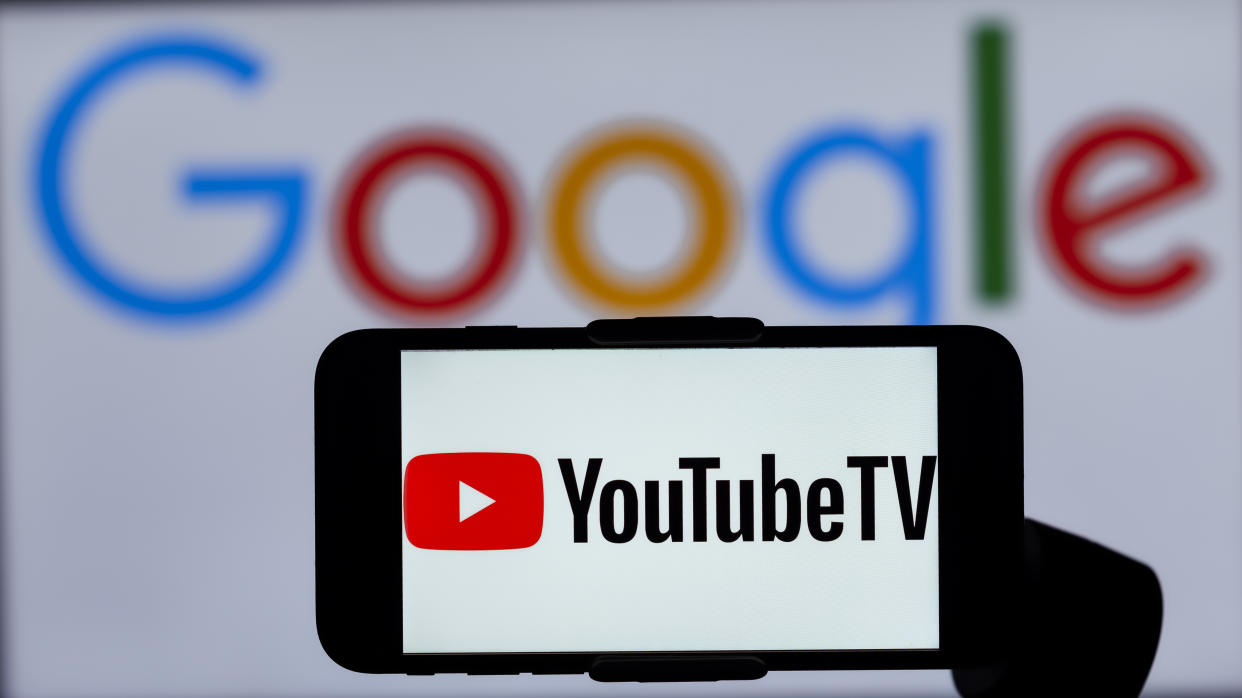 INDIA - 2023/02/16: In this photo illustration, the logo of YouTube TV is seen displayed on a mobile phone screen with a Google logo in the background. (Photo Illustration by Idrees Abbas/SOPA Images/LightRocket via Getty Images)
