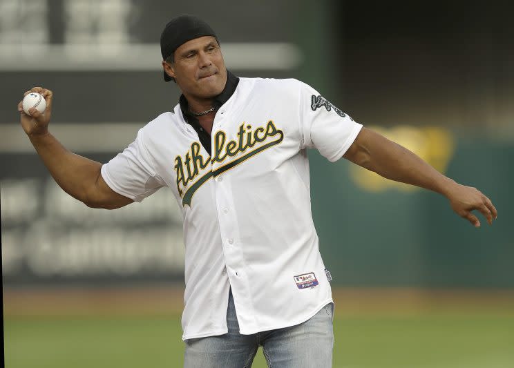 Jose Canseco will suit to play baseball once again. (AP Photo)