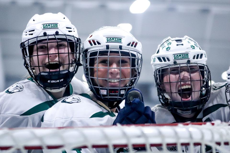 Canton players celebrate after a win during the Sweet 16 game against Milton in the Div. 2 state tournament at Canton Ice House on Saturday, March 4, 2023.