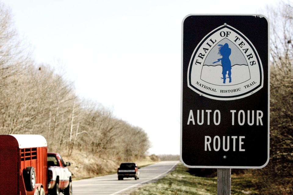 Cars travel along an Illinois highway on the Trail of Tears Auto Tour Route. Cherokee were forced westward to Oklahoma along the infamous trail, where many died and are buried. (AP Photo/James A. Finley)