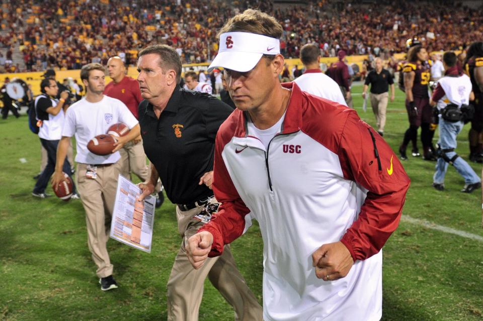 Sep 28, 2013; Tempe, AZ, USA; USC Trojans head coach Lane Kiffin reacts after losing to the Arizona State Sun Devils 62-41 at Sun Devil Stadium. Mandatory Credit: Matt Kartozian-USA TODAY Sports