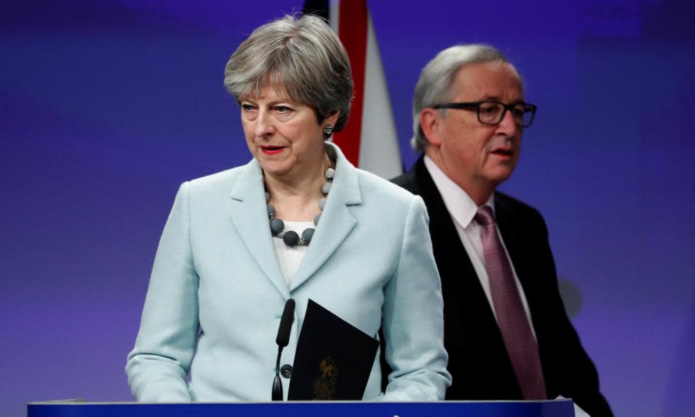 Theresa May and European Commission President Jean-Claude Juncker hold a news conference at the EC headquarters in Brussels on 8 December 8.