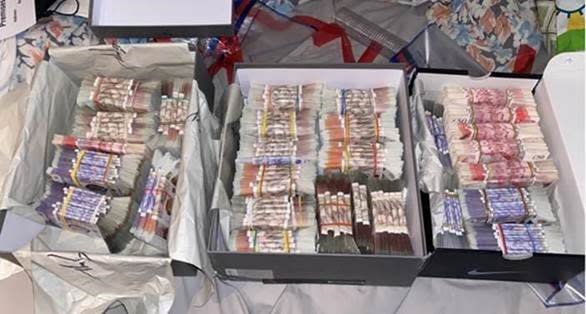 Police found more than £200,000 in cash at the address. (Met Police)