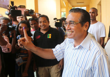 East Timor presidential candidate Francisco Guterres of the FRETILIN party shows his ink marked finger after he casts his ballot during the presidential election in Dili, East Timor March 20, 2017. REUTERS/Lirio da Fonseca