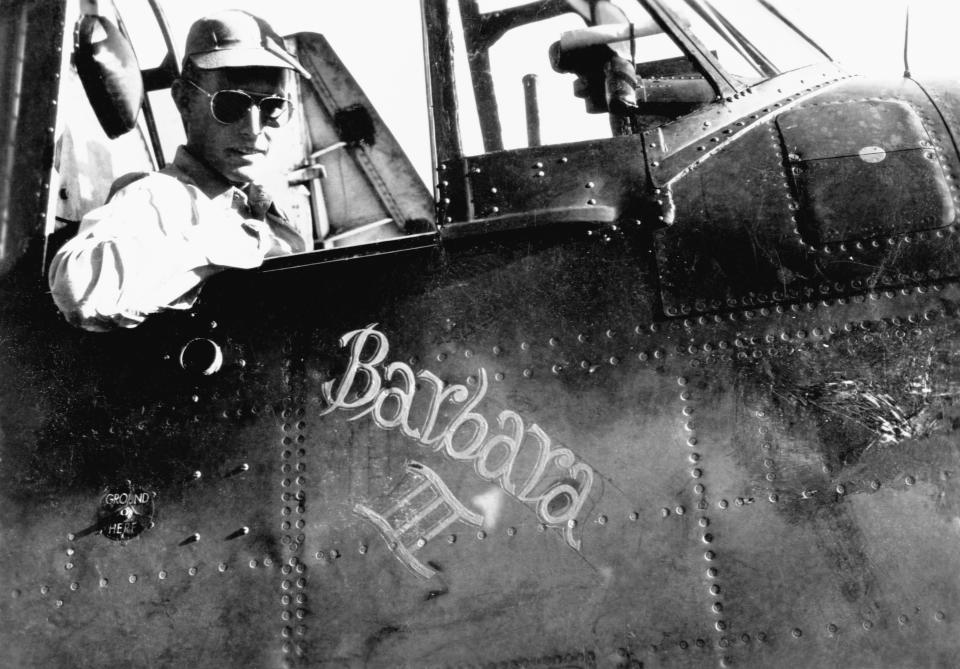 U.S. Navy pilot George Bush, c. 1943-45, in the cockpit of his torpedo bomber Barbara III, named after his girlfriend and future wife. (Photo: Corbis)