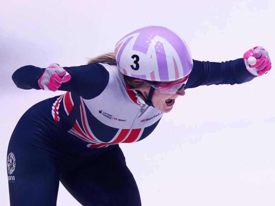 Elise Christie celebrates after her victory in Rotterdam (Getty Images)