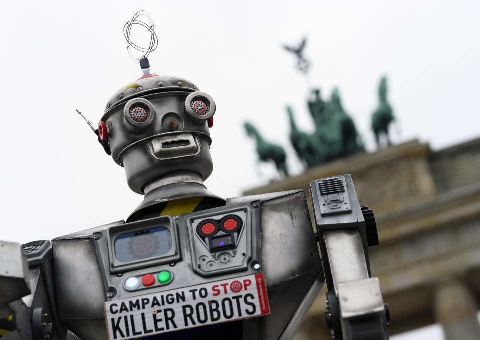 Activists from the Campaign to Stop Killer Robots, a coalition of non-governmental organisations opposing lethal autonomous weapons or so-called 'killer robots', stage a protest at Brandenburg Gate in Berlin, Germany, March, 21, 2019. REUTERS/Annegret Hilse