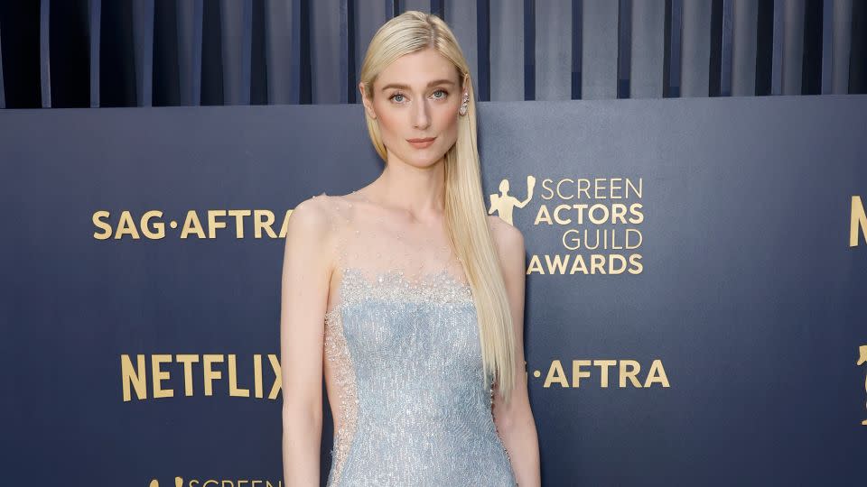 Elizabeth Debicki in an ice blue ombre Giorgio Armani gown, with floral embroidery detailing. - Frazer Harrison/Getty Images