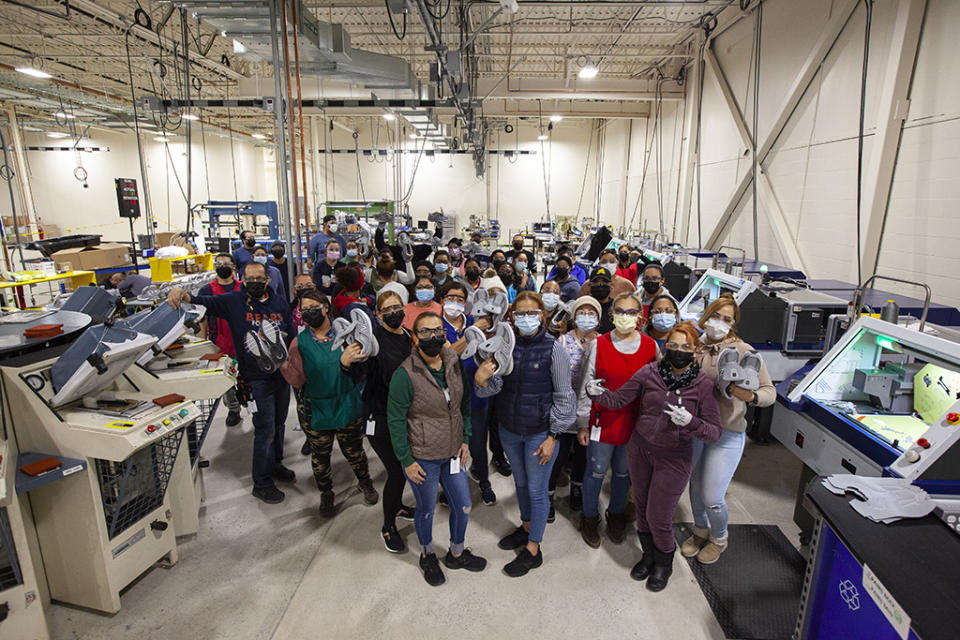 The employees of the New Balance factory in Methuen, Mass. - Credit: Courtesy of New Balance