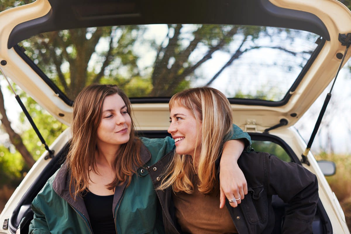 Two females take a roadtrip together.