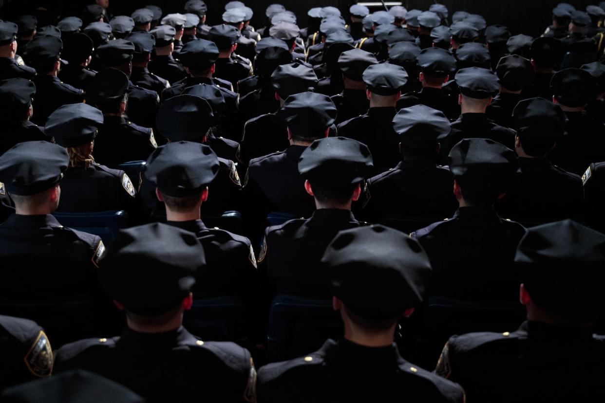 new york, ny march 30 the newest members of the new york city police department nypd attend their police academy graduation ceremony at the theater at madison square garden, march 30, 2017 in new york city over 600 new officers were sworn in during the ceremony photo by drew angerergetty images