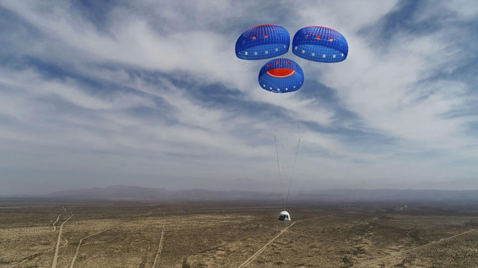 In this April 14, 2021 photo made available by Blue Origin, the New Shepard Crew Capsule descends from space on during a test in West Texas. (Blue Origin via AP)