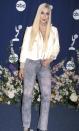 <p>Donning a new blonde look and rhinestone jeans for the 2000 Emmy Awards. </p>