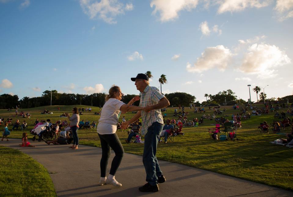 From left, Marilyn Simonds, 72, and Larry Lewis, 83, dance to music during the Bay Jammin' Concert at Cole Park Amphitheater in this 2018 file photo.