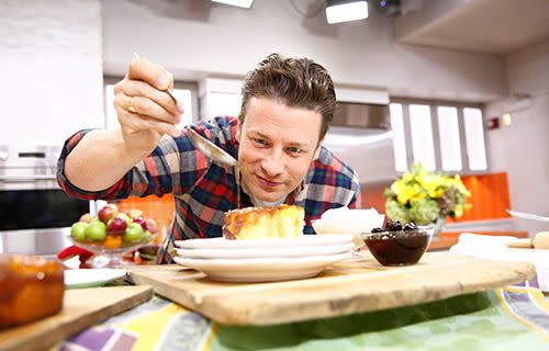 Jamie Oliver in action. Photo: Getty.