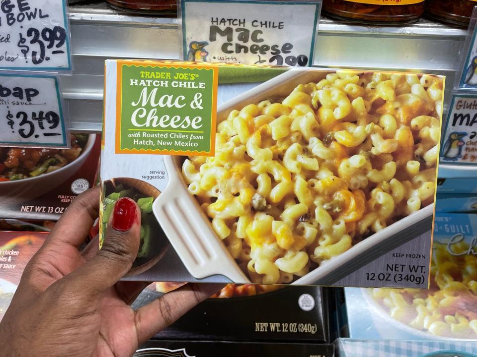 hand holding trader joes green chile mac and cheese