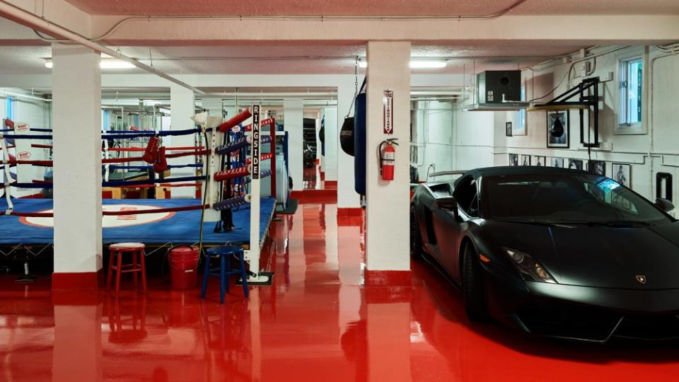 The garage features a boxing ring - Credit: Mike Ruiz