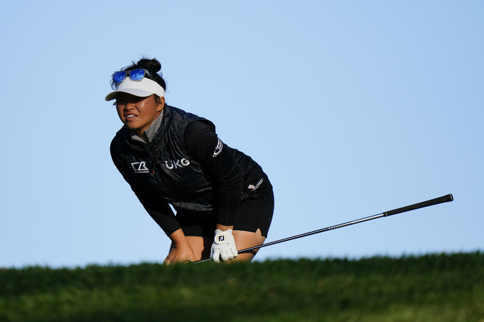 Megan Khang watches her tee shot on the eighth hole during the first round of the KPMG Women's PGA Championship golf tournament at the Aronimink Golf Club, Thursday, Oct. 8, 2020, in Newtown Square, Pa. (AP Photo/Matt Slocum)