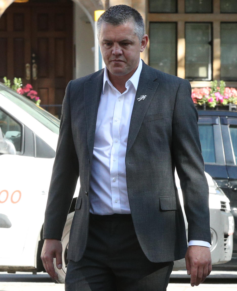 Paul Bussetti arrives at Westminster Magistrates' Court in London where he denies sending a "grossly offensive" video on WhatsApp and causing footage of a "menacing character" to be uploaded on YouTube. (PA)