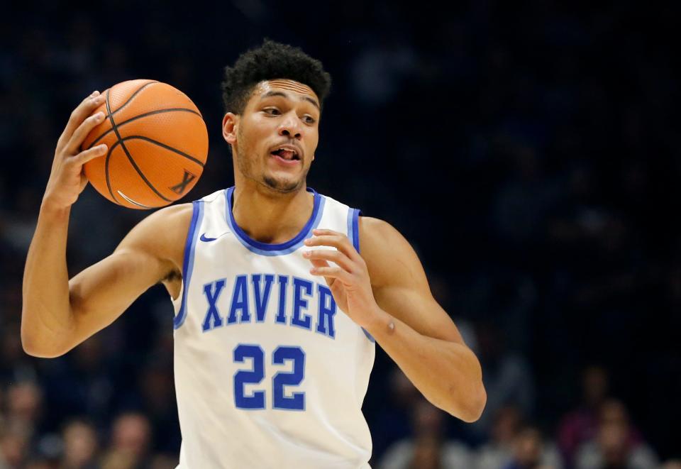 Xavier Musketeers forward Kaiser Gates (22) catches a pass in the first half of the NCAA Big East Conference basketball game between the Xavier Musketeers and the Georgetown Hoyas at the Cintas Center in Cincinnati on Saturday, Feb. 3, 2018.