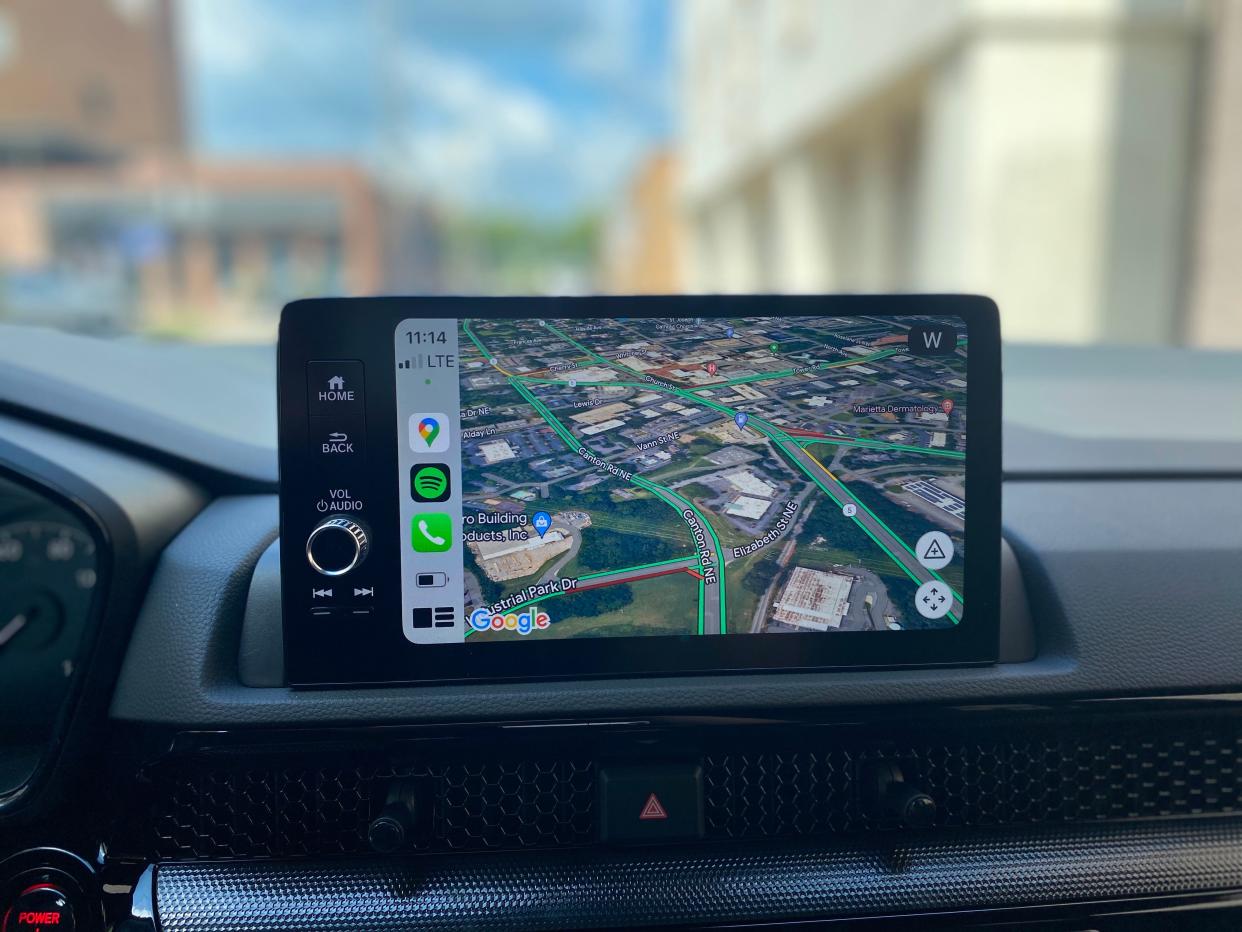 Google Maps and Apple CarPlay on a 2025 Honda CR-V Hybrid's 9-inch infotainment touchscreen.