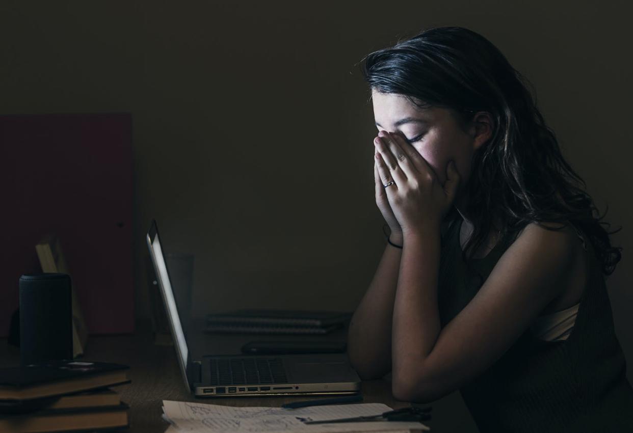 <span class="caption">Women journalists who engage with their audience often experience harassment and ugly comments.</span> <span class="attribution"><a class="link " href="https://www.gettyimages.com/detail/photo/upset-teenage-girl-by-computer-royalty-free-image/523554190?adppopup=true" rel="nofollow noopener" target="_blank" data-ylk="slk:Justin Paget/Stone/Getty Images;elm:context_link;itc:0;sec:content-canvas">Justin Paget/Stone/Getty Images</a></span>