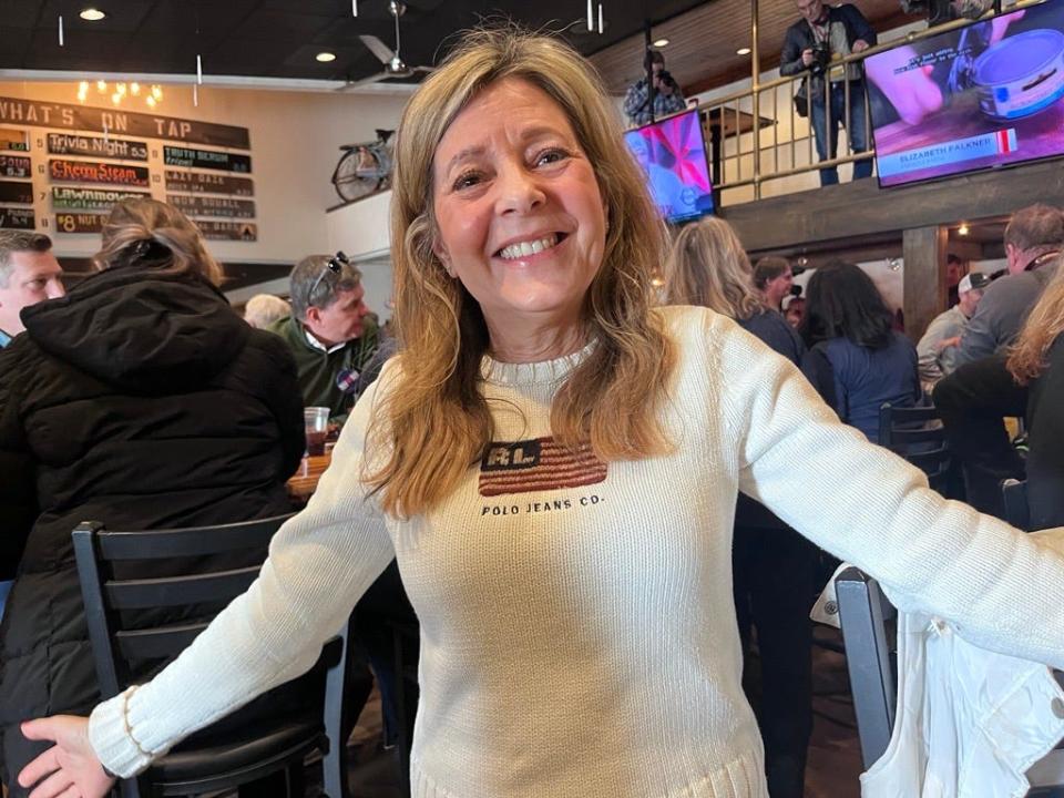 Carol Booth, 65, wore her daughter’s old cream-colored flag shirt before heading to one of Haley’s events at a brewery in Manchester, N.H.