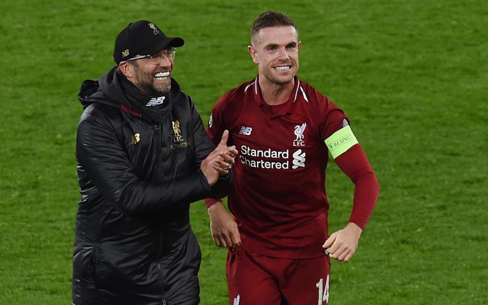 Jurgen Klopp and Jordan Henderson, one of three survivors from 2014's 'surprise' title-challenging side, celebrate victory over Napoli and Champions League progress - Liverpool FC