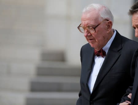 FILE PHOTO: Retired U.S. Supreme Court Justice John Paul Stevens departs the funeral of U.S. Supreme Court Associate Justice Antonin Scalia at the Basilica of the National Shrine of the Immaculate Conception in Washington