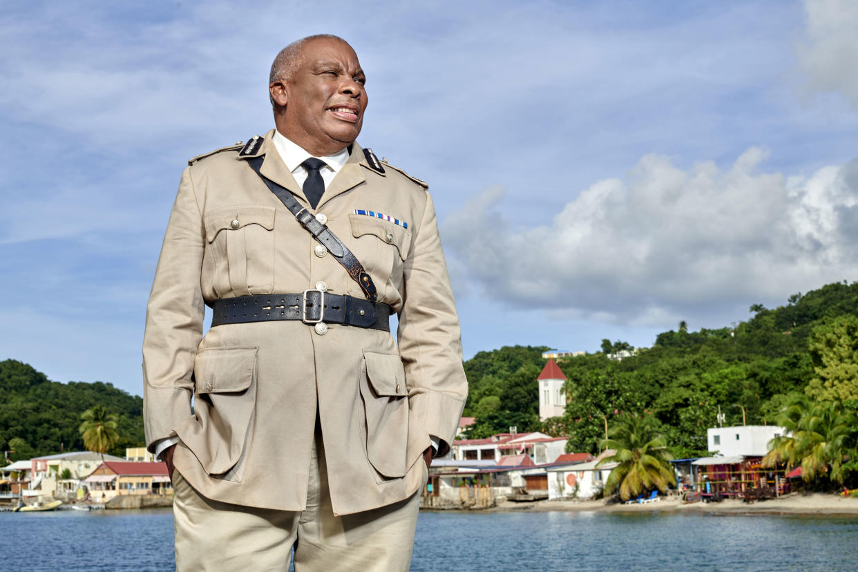 Don Warrington as Commisioner Selwyn Patterson next to the fishing village of Deshaies. (BBC)
