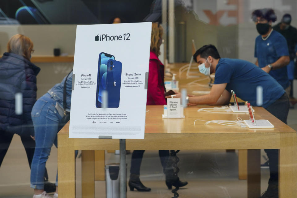 Photo by: John Nacion/STAR MAX/IPx 2020 10/27/20 A view of an Apple Iphone 12 advertisement inside an Apple Store in Lincoln Center. New York City continues Phase 4 of re-opening following restrictions imposed to slow the spread of coronavirus on October 27, 2020 in New York City. The fourth phase allows outdoor arts and entertainment, sporting events without fans and media production.