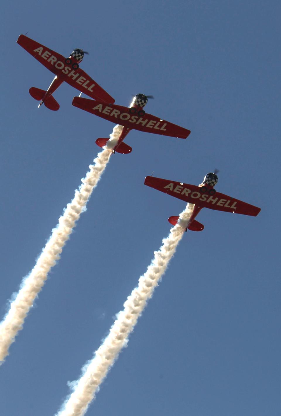 Airshow fans and aircraft meet up for a weekend of fun at the 2023 Stuart Air Show at Witham Field on Saturday, Nov. 11, 2023, in Stuart. Acrobatic airplanes and military jets, along with helicopter action entertains the fans during the annual three-day event during Veterans Day weekend.