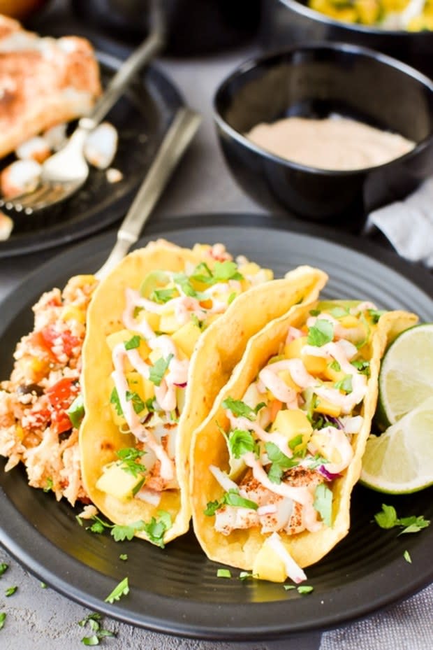 <p>The Foodie and The Fix</p><p>These Chipotle fish tacos with mango salsa are quick, easy and full of fresh summer flavor!</p><p><strong>Get the recipe: <a href="https://thefoodieandthefix.com/chipotle-fish-tacos-mango-salsa-air-fryer-oven-stovetop/" rel="nofollow noopener" target="_blank" data-ylk="slk:Air Fryer Chipotle Fish Tacos;elm:context_link;itc:0;sec:content-canvas" class="link ">Air Fryer Chipotle Fish Tacos</a></strong></p>