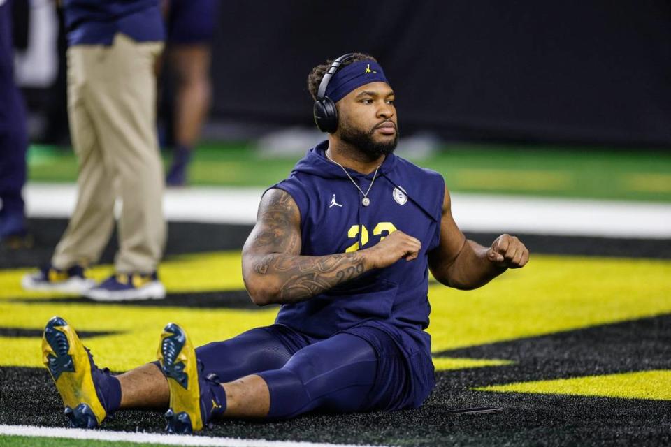 Michigan linebacker Michael Barrett warms up before the national championship game at NRG Stadium in <a class="link " href="https://sports.yahoo.com/nfl/teams/houston/" data-i13n="sec:content-canvas;subsec:anchor_text;elm:context_link" data-ylk="slk:Houston;sec:content-canvas;subsec:anchor_text;elm:context_link;itc:0">Houston</a> on Monday, Jan. 8, 2024. Junfu Han/Junfu Han / USA TODAY NETWORK